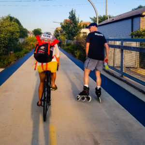 Brad skates down bike path