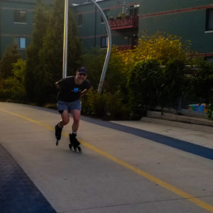 Brad skates down bike path