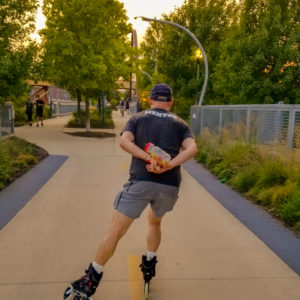 Brad skates down bike path