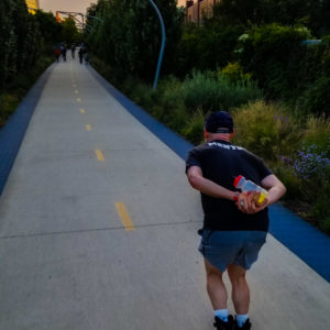 Brad skates down bike path